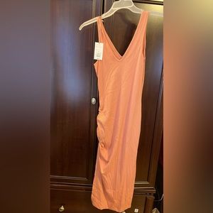 NWT light orange/tangerine fitting maxi dress that highlights your curves